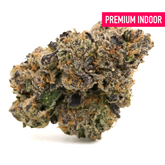Premium indoor THCa flower with purple and orange hues and dense trichomes in Love Affair Indoor THCa Flower
