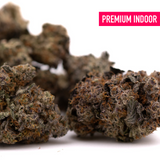 Peach Tree THCa Flower with purple hues and orange pistils, premium hemp flower