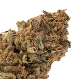 Dense brown THCA Hemp Flower with trichomes, green and purple hues, rich flavor profile