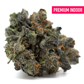 Purple Wedding Cake Indoor THCa Flower with purple hues, white trichomes, and orange pistils