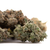 Dried Street Tarts Indoor THCa Flower with green hue, purple coloration, and visible trichomes