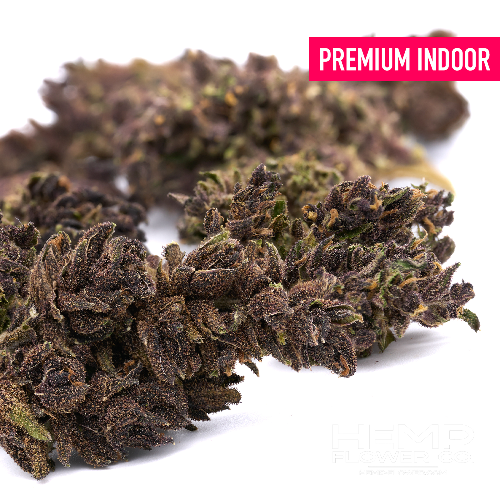 Clusters of dark purple and green cannabis buds from After Dark Indoor THCa Flower Wholesale for wholesale customers