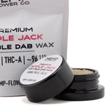 Black cylindrical container with white label holding 5 gram apple jack thca crumble wax hemp flower product