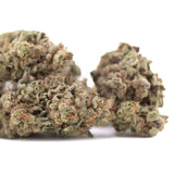 Dried bahama bussdown hemp flower with dense green and brown buds from greenhouse thca harvest