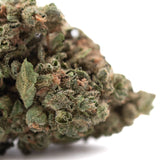 Banana og thca flower wholesale dense green bud with fine trichomes and orange pistils from legendary genetics exotic banana