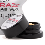 Black plastic jar with white label containing premium blue raz thca budder wax 5 gram for concentrate use