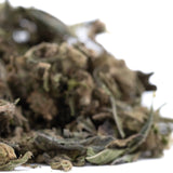 Dense dried blueberry muffin thca trim hemp flower bud with green and brown hues for wholesale use