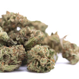 Green and brown dense frosty hemp flower buds from candy pave’s greenhouse smalls with thca content