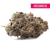 A dense cherry truffle greenhouse thca hemp flower bud with green brown hues and a rich terpene profile