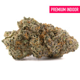 Dense textured chicken and waffles indoor thca flower bud with green and orange hues for hemp flower wholesale use