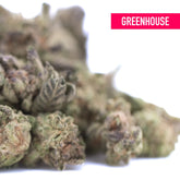 A dense green and purple-tinged chicken and waffles thca greenhouse smalls hemp flower resembling kush mints