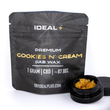 Black pouch of ideal plus premium cookies and cream 1 gram cbd dab wax with golden text and amber concentrate jar