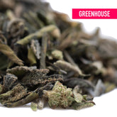 A pile of dried curly green deep chunk tea leaves with fuzzy texture known for romulan x deep sedative effects