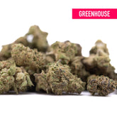 A pile of dense green and brown deep space thca hemp flower greenhouse smalls with frosty texture