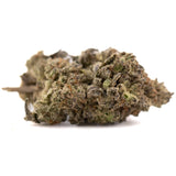 Dough Boy THCa Hemp Flower: Green bud with white trichomes, purple hues, Greenhouse label