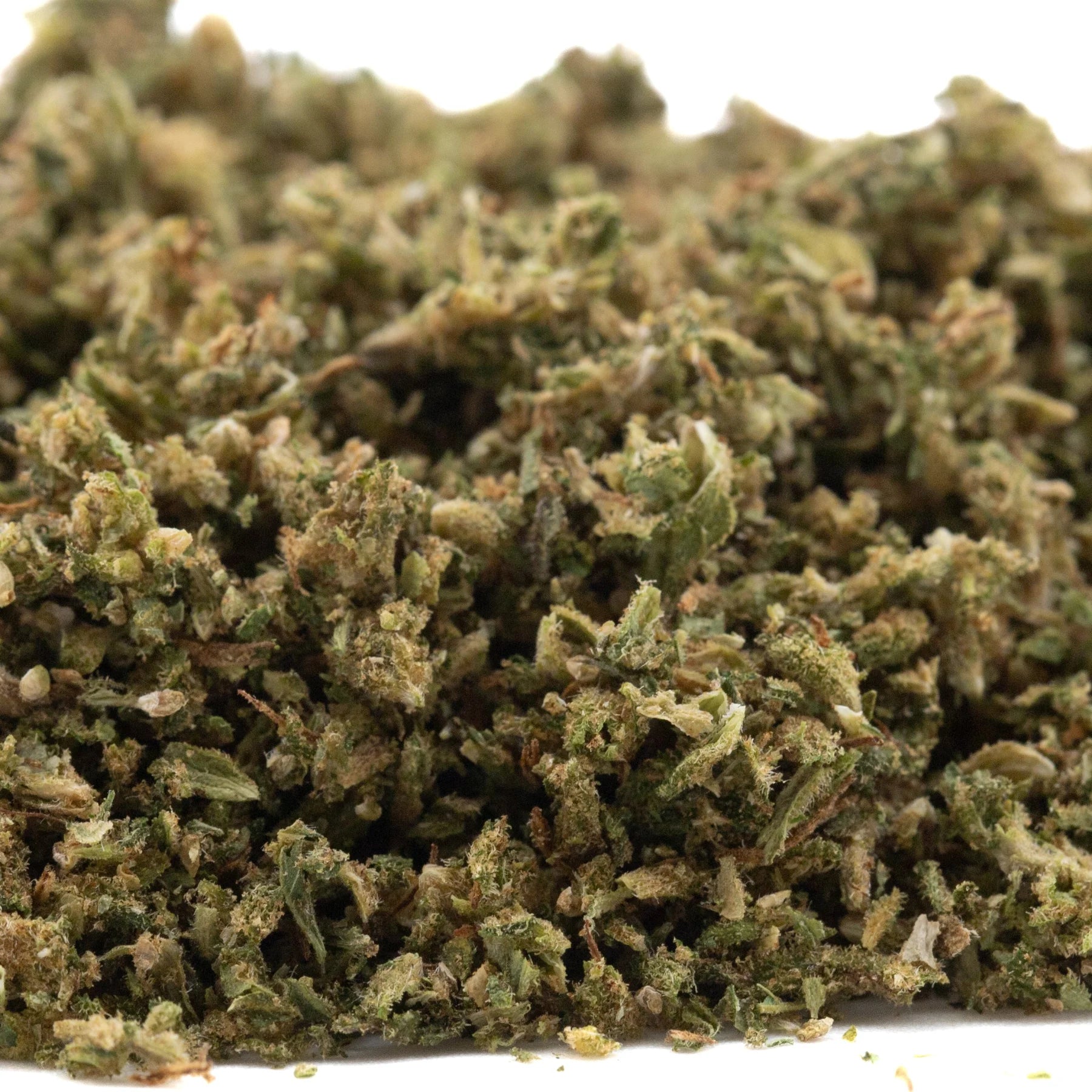 A pile of early cherry full-term dried hemp flower buds with green brown and hints of purple hues and minor cannabinoids