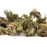 Early trump cbd hemp flower full-term smalls with dried green and brown buds covered in fine trichomes