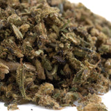 A pile of elektra full-term cbd hemp flower trim with a terpene profile in green brown and purple hues