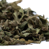 Dried green mint leaves with earthy texture from emerald fires premium full-term thca trim wholesale product