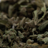 Dried sage leaves with textured muted green and gray hues in emerald fires premium full-term thca trim wholesale product