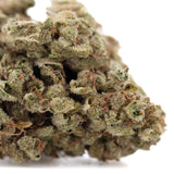 Premium Face Fat THCa hemp flower: green purple bud with dense trichomes