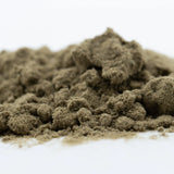 A mound of fine earthy brown fog dog kief showcasing concentrated potency from hemp flower material
