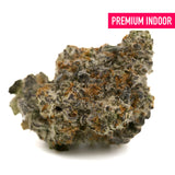 Frosted Runtz Indoor THCa Flower with dense purple and orange cannabis buds rich in trichomes