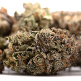 Close-up of GAS Indoor THCa Flower with trichomes and orange hairs showing terpene profile