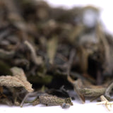 Dried sage leaves in muted greenish brown texture from gassa purple’s greenhouse thca trim wholesale product