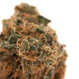 Gelato Mints Indoor THCa Flower with orange hairs, green leaves, and trichomes