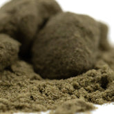 Dark green textured thca kief powder in soft mounds for jelly donut full-term wholesale including louis xiii scout cookies