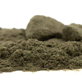 Olive-green textured mossy terrain with molded rock formations featured in jelly mints thca kief full-term sleep support
