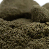 Dense dark green artificial moss with textured fibrous surface for jelly mints thca kief hemp flower product