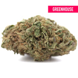 A dense greenish brown jokerz candy thca hemp flower bud with visible trichomes for grape gasoline mood elevation
