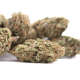 Jokerz candy thca hemp flower greenhouse showing green and brown dense frosty buds for grape gasoline mood elevation