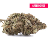 Joy thca hemp flower greenhouse dense green and brown bud covered in trichomes with lemon kush terpene profile