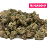 Pile of Lemon Cherry Gelato THCa Indoor Flower Smalls showcasing premium cherry gelato THCa cannabis