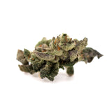 Dense green lemon octane cbd smalls flower with frosty white trichomes and orange pistils smalls hemp flower