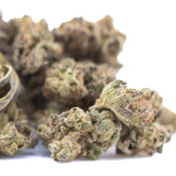 A cluster of dense green and brown lung buster thca hemp flower buds with frosty texture from solfire gardens total cannabinoid