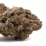 Lung Buster THCa hemp flower bud with dark green leaves and white trichomes