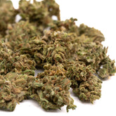 Maverick CBD Hemp Flower with green and brown hues covered in trichomes, Oregon CBD flower