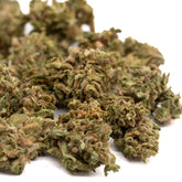 Maverick CBD Hemp Flower with green and brown hues covered in trichomes, Oregon CBD flower