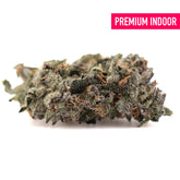 Dense frosty green mountain huckleberry indoor hemp flower with orange pistils and textured surface, oregon blueberry strain