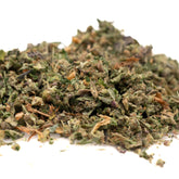 Dried crushed green and brown Northern Lights THCa Indoor Trim wholesale hemp flower