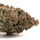 Oregon Mac Indoor THCA Flower with vibrant trichome-covered cannabis bud and orange hairs