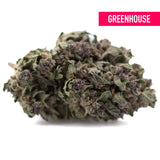 Dense green and purple-tinged purple daiquiri hemp flower with frosty texture resembling grape pie cannabis bud