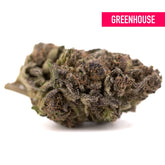 Purple Mountain Majesty THCa hemp flower with green bud and dark trichomes