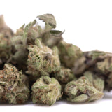 A pile of purple pop rocks hemp flower greenhouse smalls with green and brown buds covered in fine trichomes
