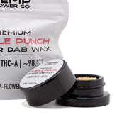 Black cylindrical container with white label showing premium purple punch thca budder wax holding light purple crystalline wax
