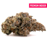 Raspberry Runtz hemp flower with dense trichomes and orange purple hues for space cake